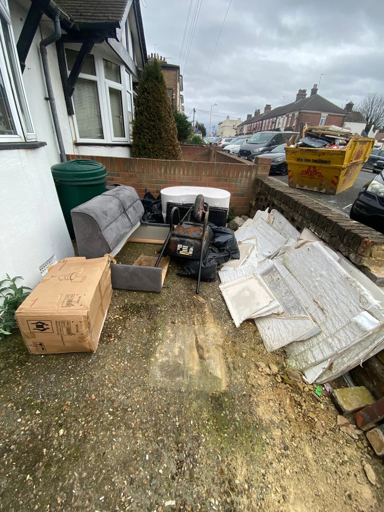 Sofa and mattress in a Gravesend side alley awaiting collection by Andy