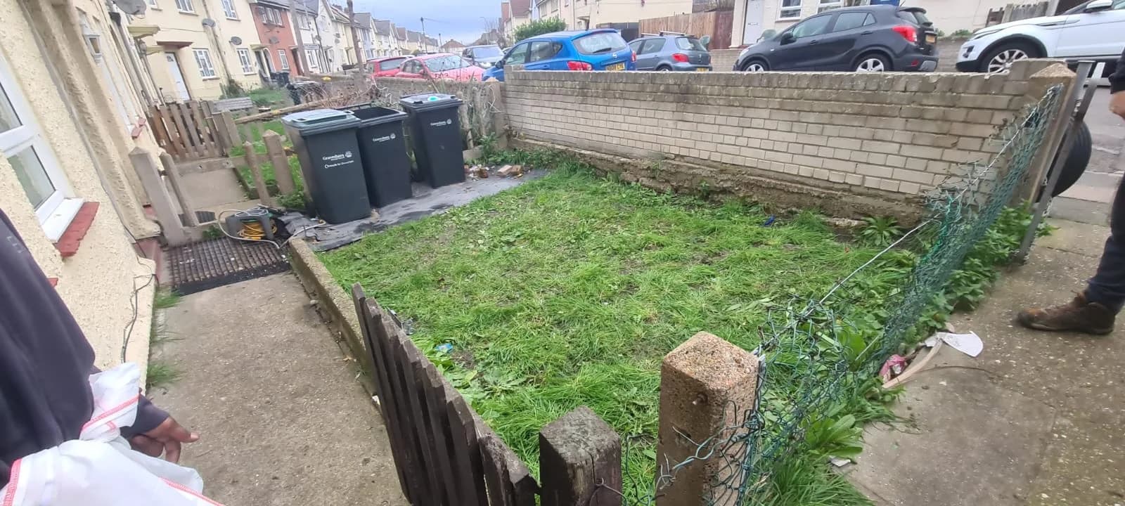 Garden cleared by Andy in Gravesend — fresh grass and tidy fence after a full clearance