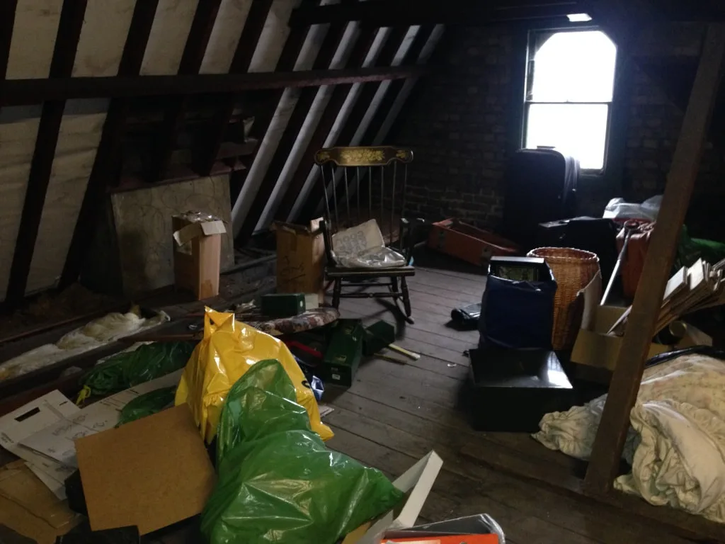 Loft clearance interior in Gravesend — Andy's team safely emptying an attic of stored items