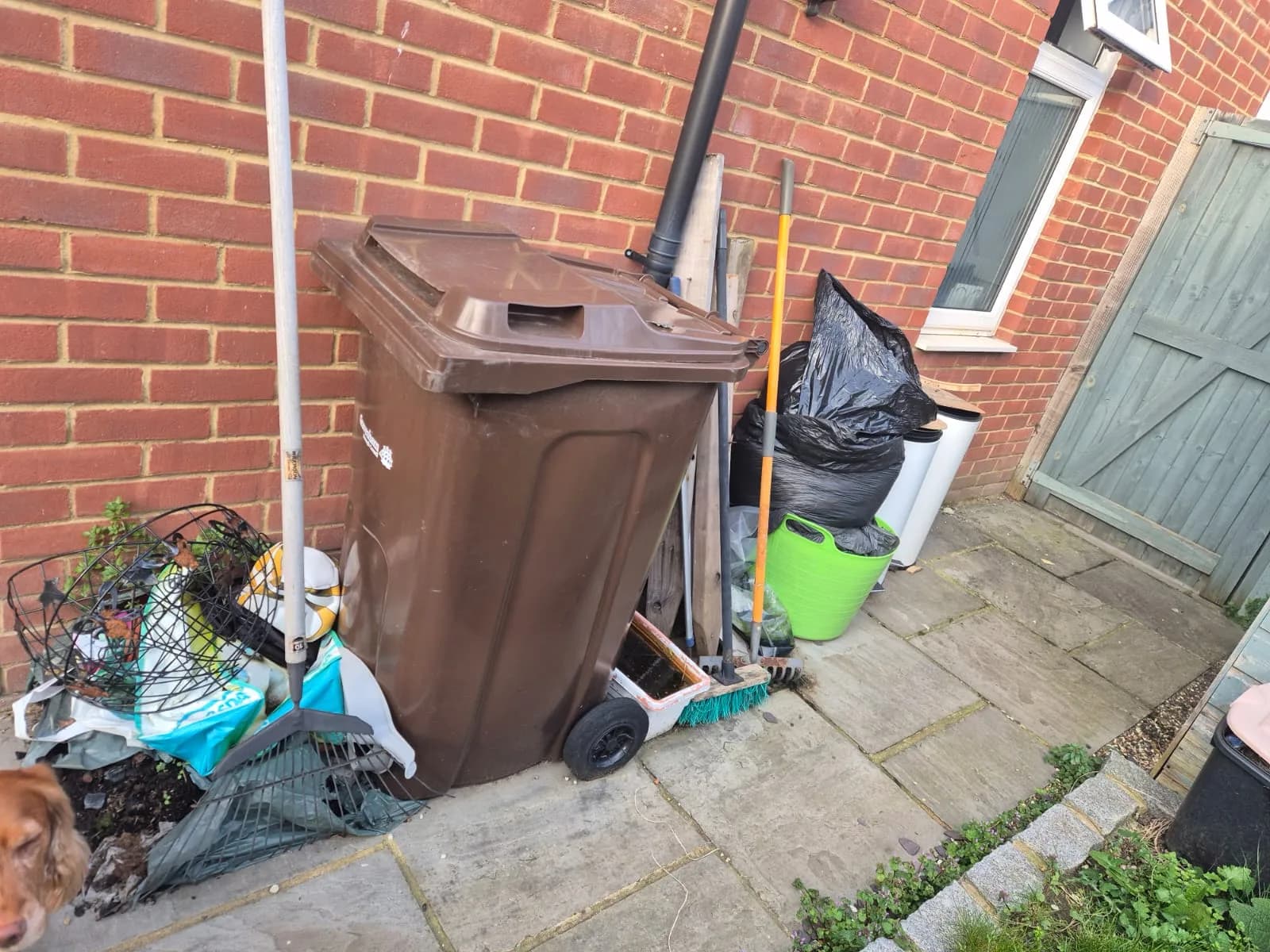 Side alley with mixed waste in Gravesend — fly-tip clearance ready for Andy's team