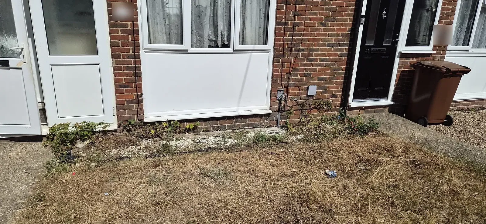 The same front lawn in Gravesend cleared after Andy took the kitchen rip-out away